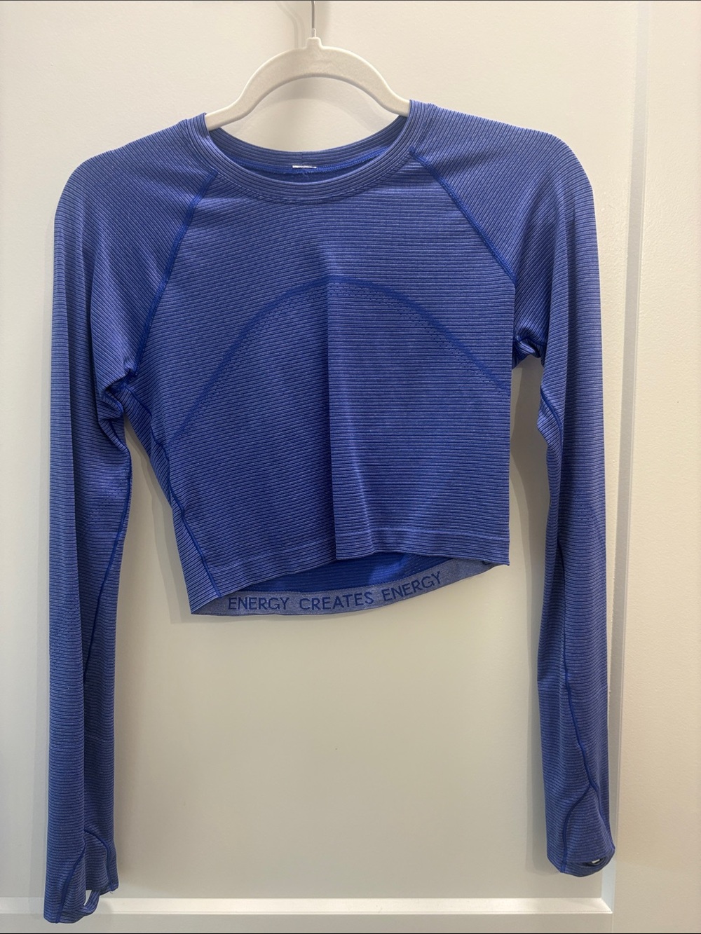 Size 4 lululemon athletica Blue with white stripes LS cropped Swiftly. Like new.